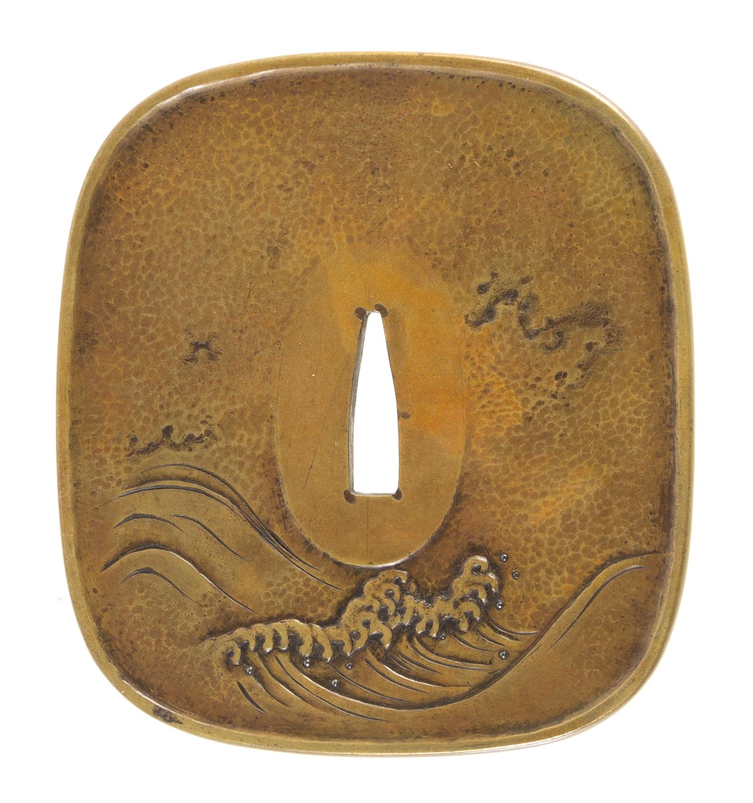 A Copper Tsuba Height 3 1/2 inches.
