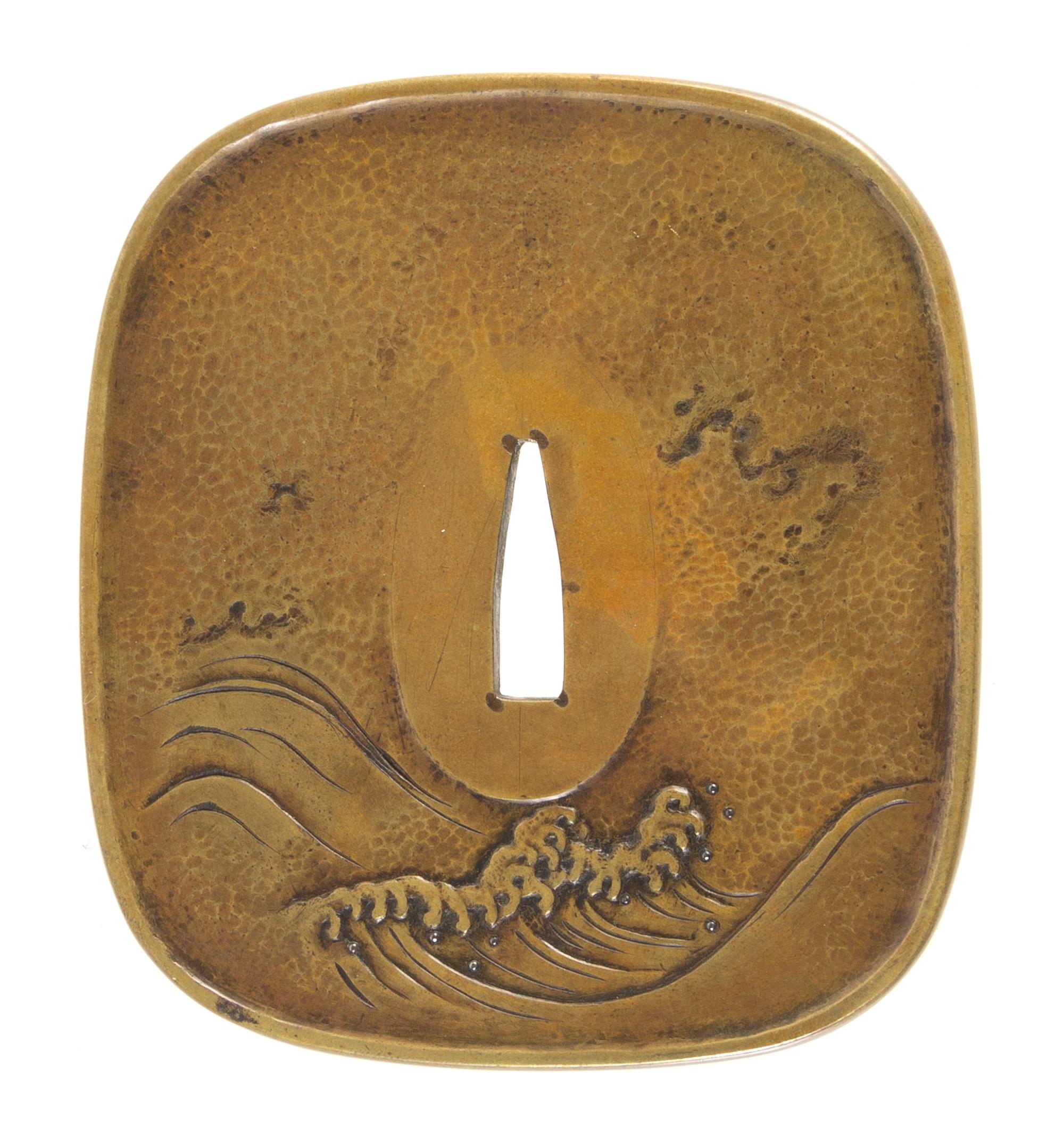 A Copper Tsuba Height 3 1/2 inches.