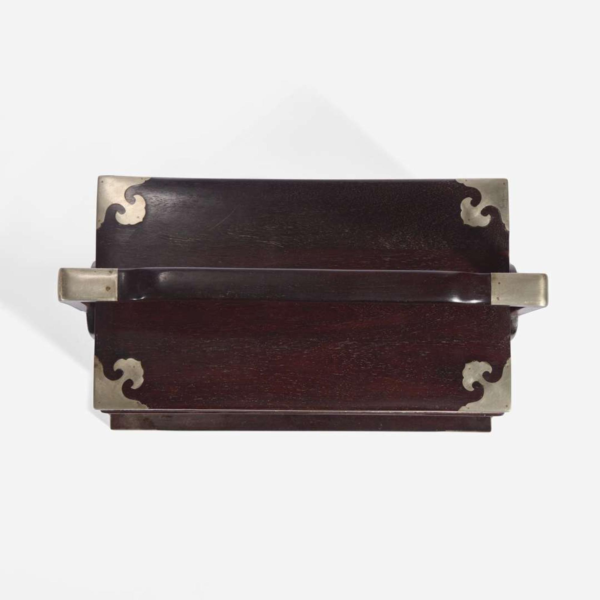 A Chinese stacking hardwood two-tier box, possibly zitan 双层提梁木盒 或紫檀