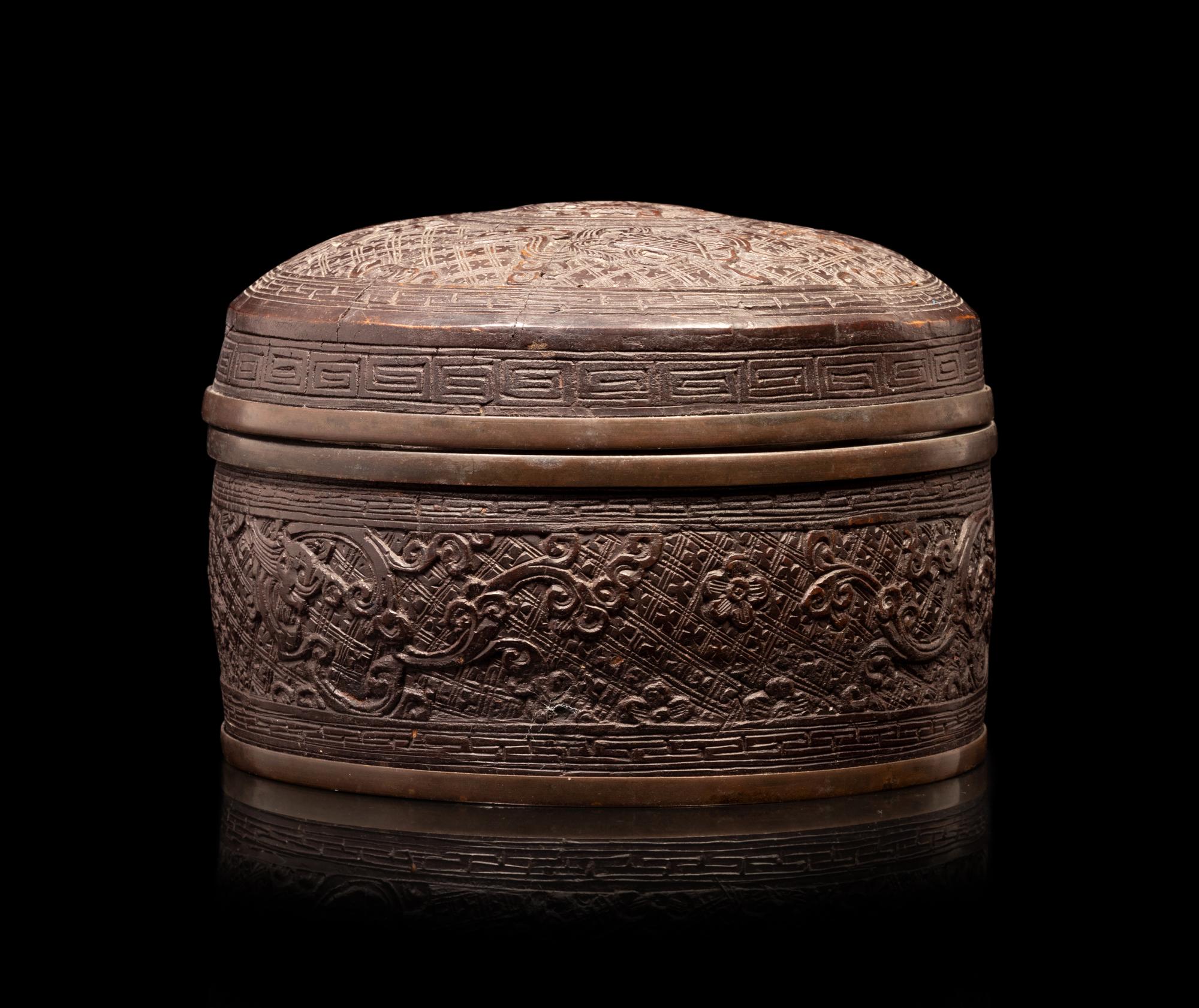 A Bronze Circular Box and Cover