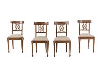 A Set of Four Regency Parcel Gilt Walnut Side Chairs