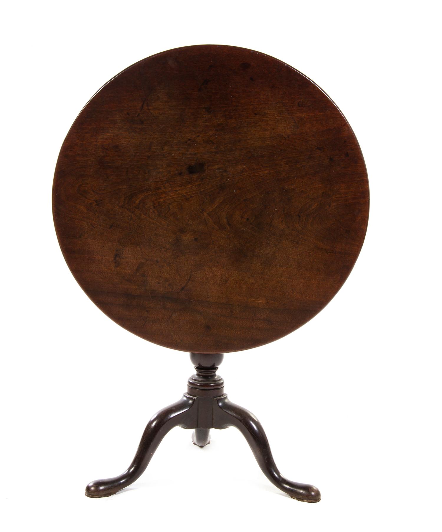 A Queen Anne Walnut Tilt-Top Tea Table, Height 27 3/4 x diameter 31 inches.