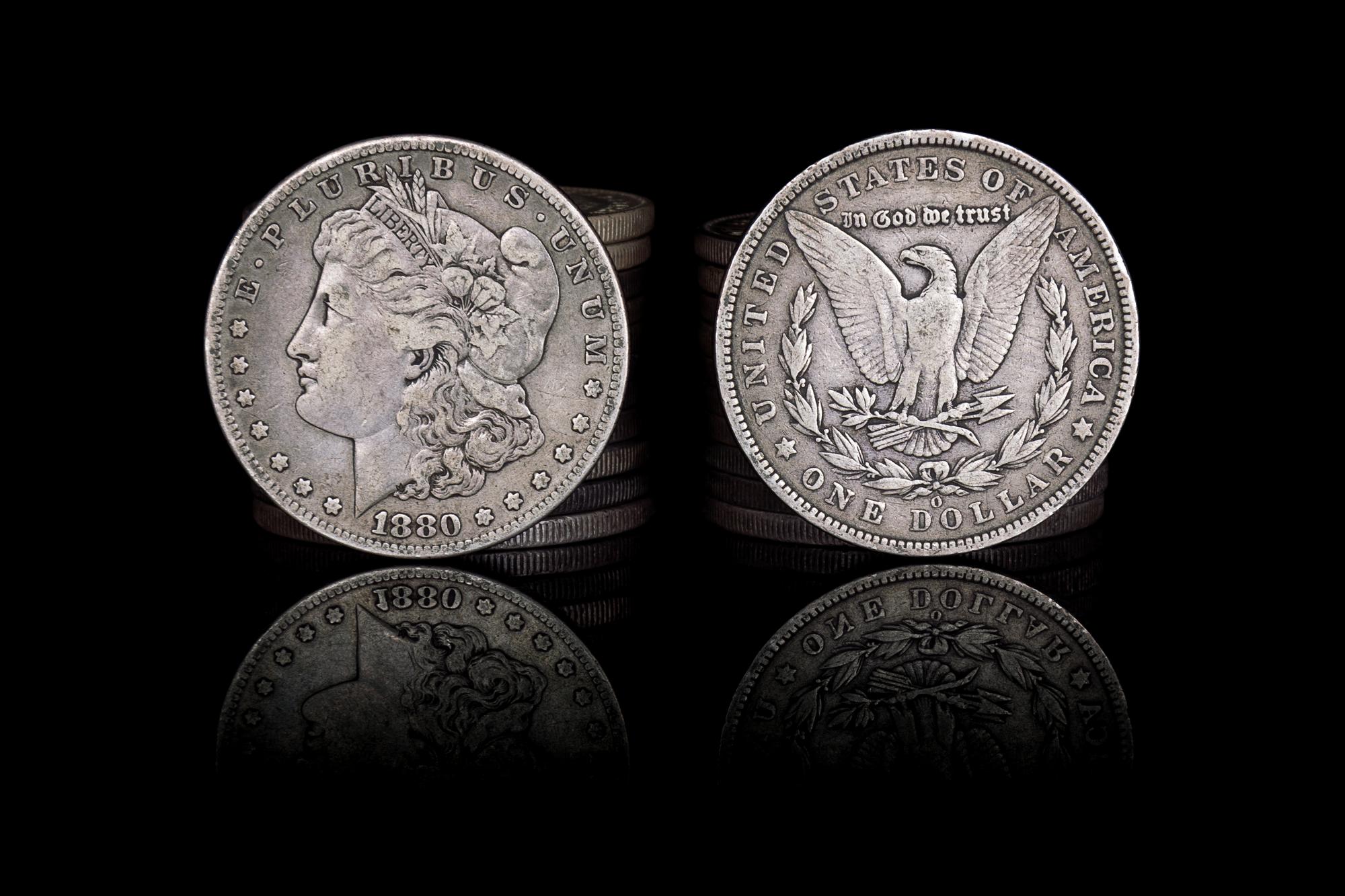 A Group of Twenty-Three United States Morgan Silver Dollar Coins