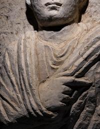 A Palmyrene Limestone Bust of a Priest