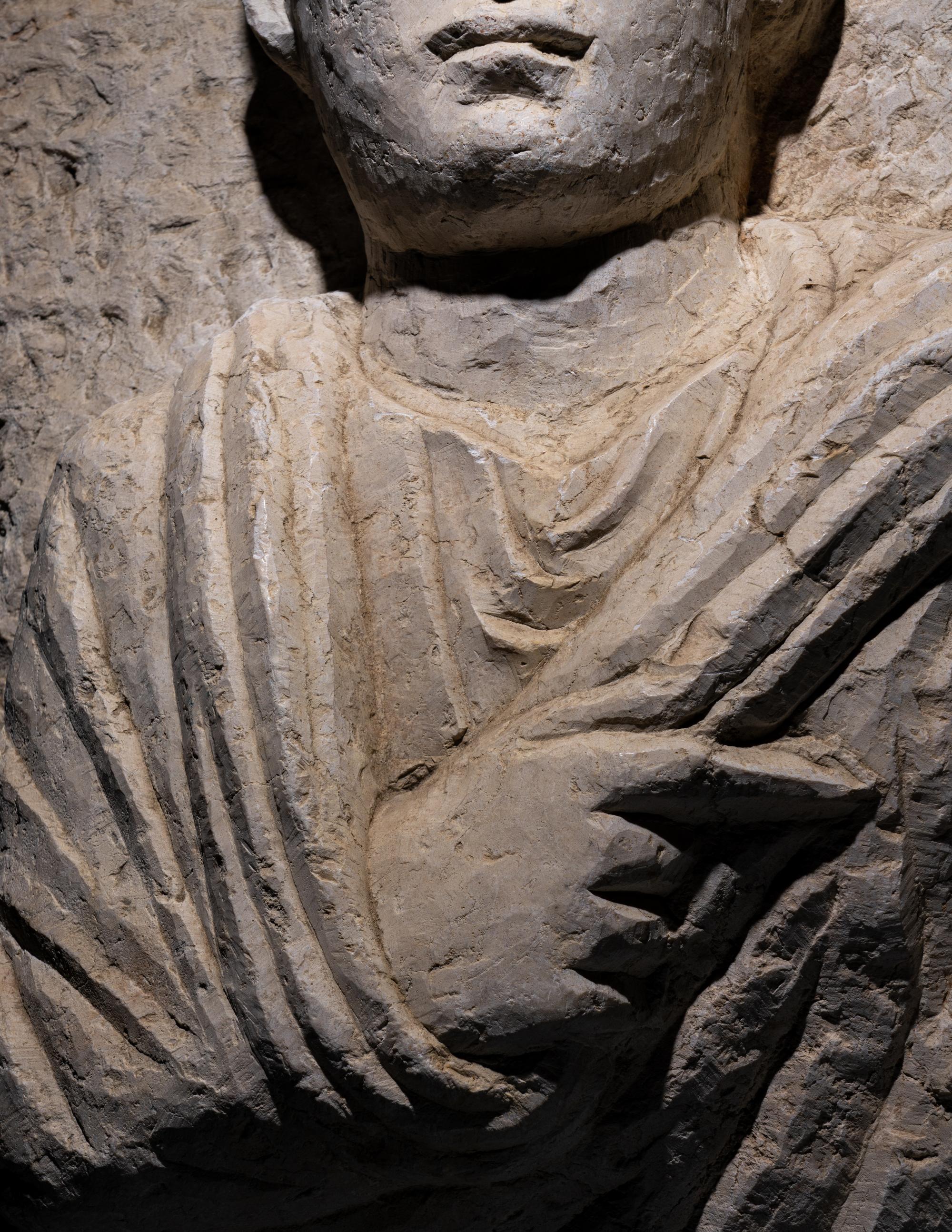 A Palmyrene Limestone Bust of a Priest