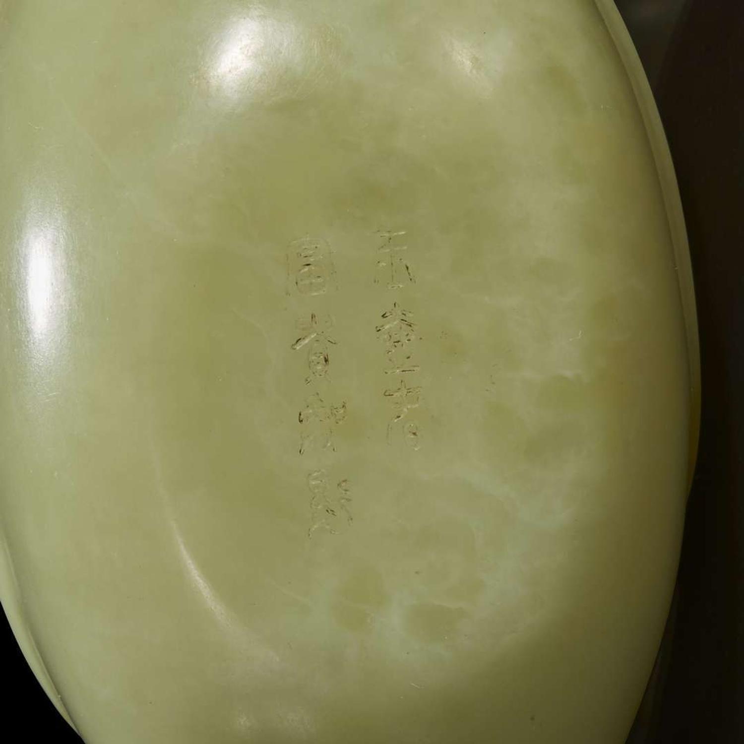 A Chinese yellowish-celadon jade teapot and cover 青黄玉雕带盖茶壶