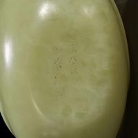 A Chinese yellowish-celadon jade teapot and cover 青黄玉雕带盖茶壶
