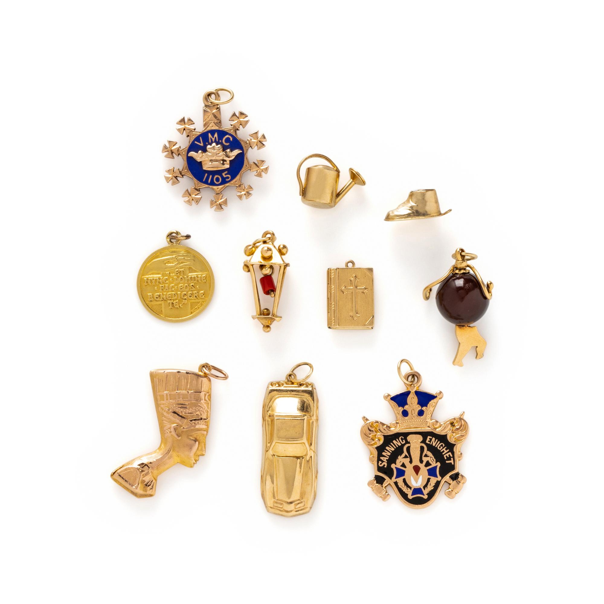 COLLECTION OF YELLOW GOLD CHARMS