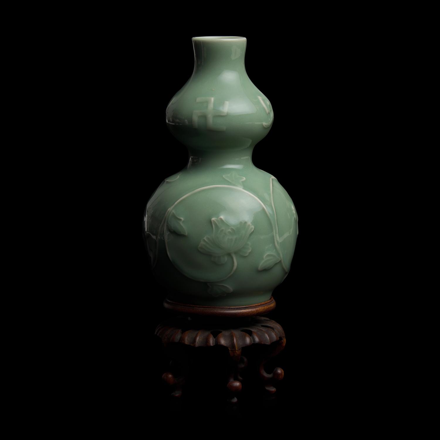 A Japanese Celadon-Glazed Double Gourd Vase, Seifu Yohei III, and Two Kogo, Suwa Sozan