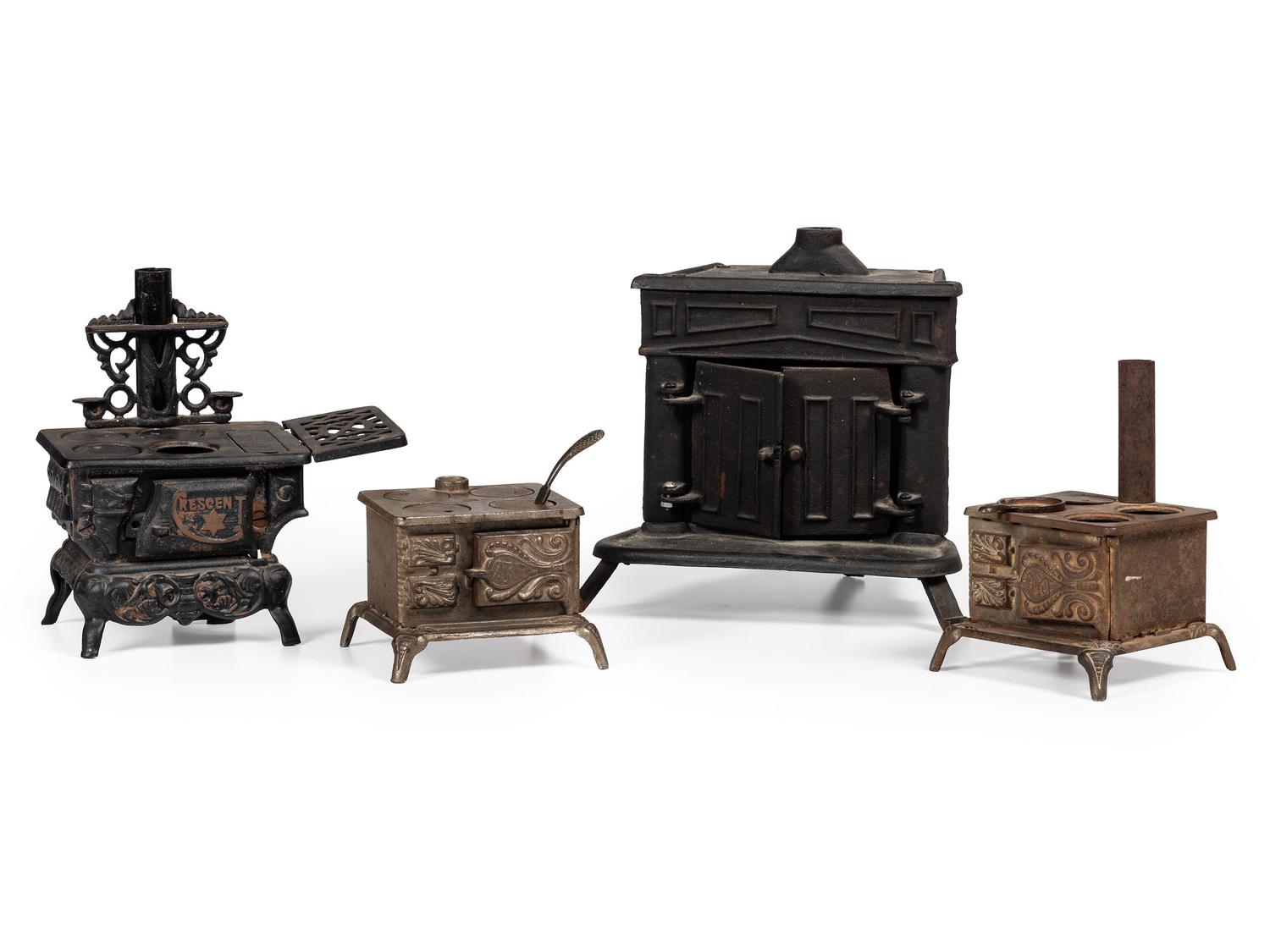 Four Salesman's Sample or Child's Toy Cast Iron Stoves