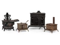 Four Salesman's Sample or Child's Toy Cast Iron Stoves