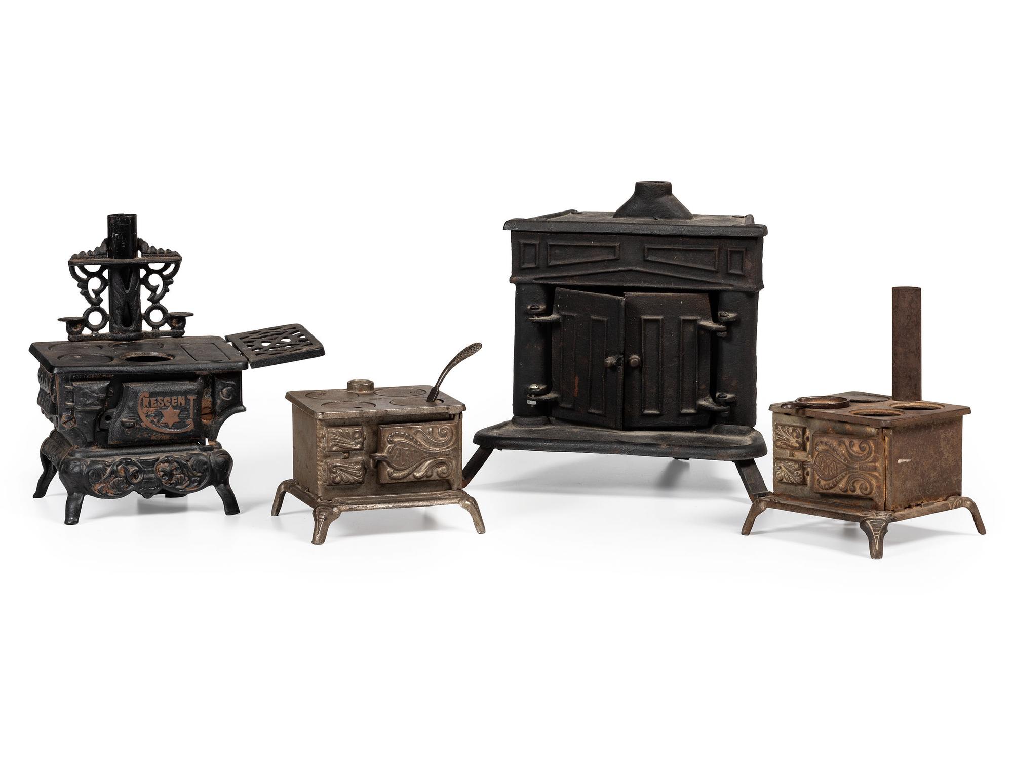 Four Salesman's Sample or Child's Toy Cast Iron Stoves