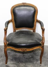 A Louis XV Style Walnut Fauteuil Height 33 inches.
