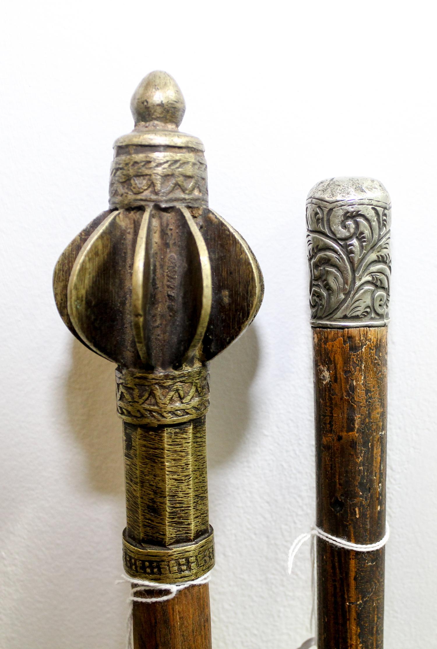 A Group of Two Canes Length of longest 35 1/4 inches.