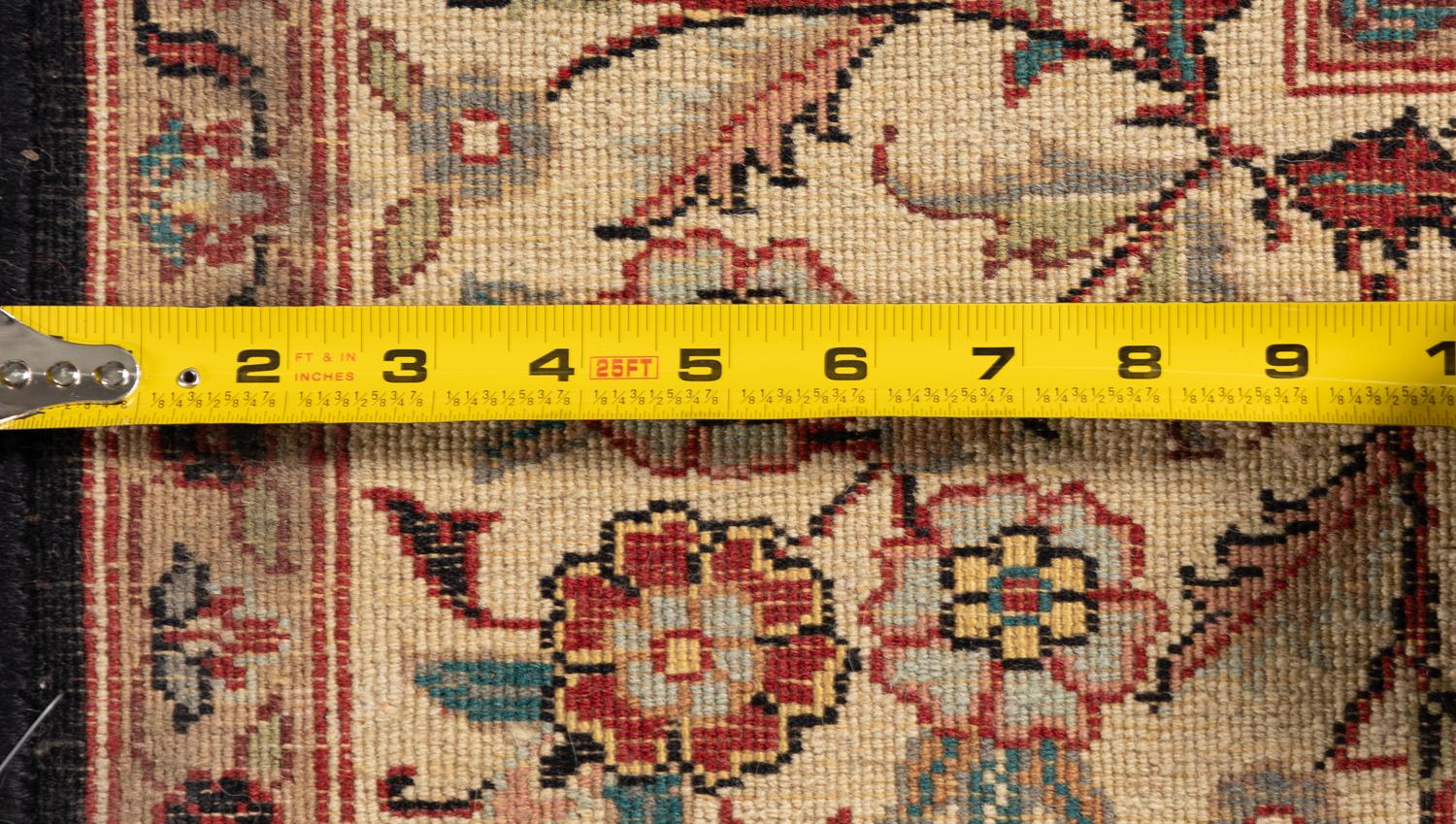 An Indo-Kashan Wool Rug