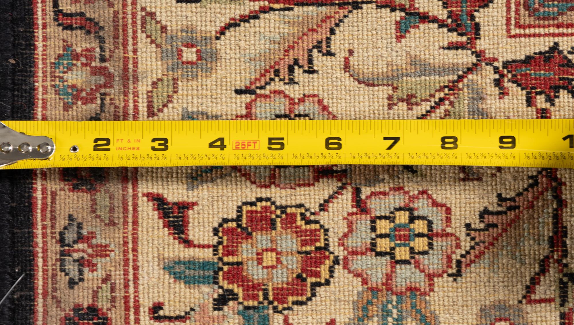 An Indo-Kashan Wool Rug