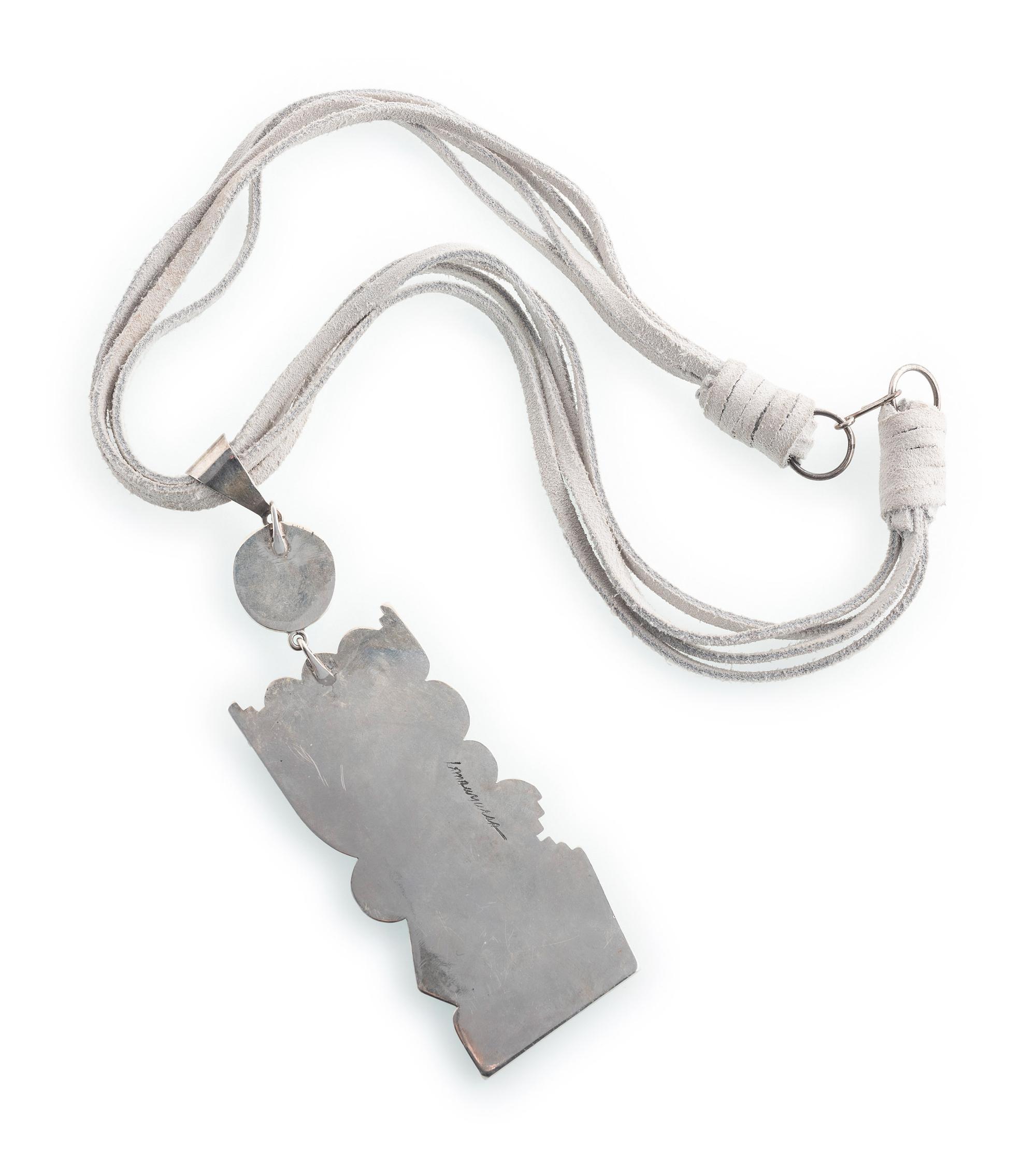 Silver and Turquoise Pendant, on a Four-Strand Suede Necklace