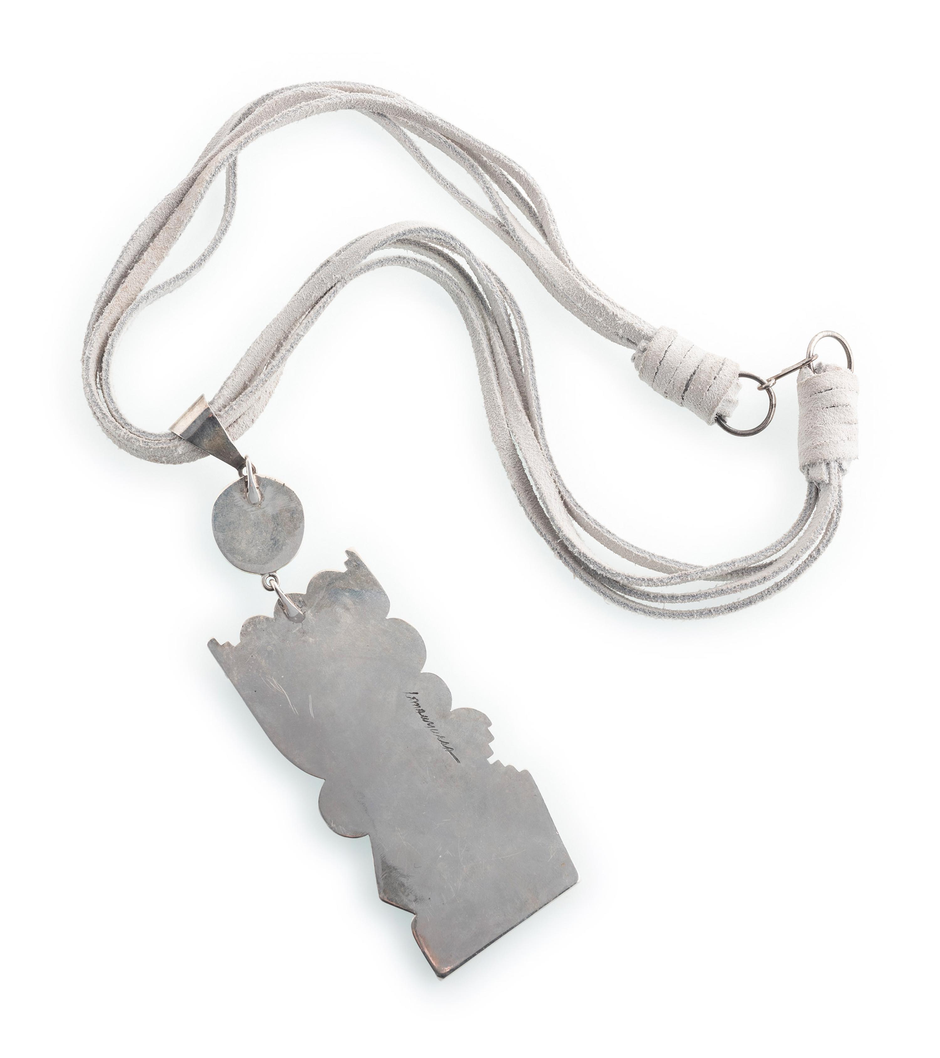 Silver and Turquoise Pendant, on a Four-Strand Suede Necklace