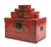 A Set of Four Red Lacquer Hinged Boxes Largest: height 5 x width 19 1/2 x depth 14 1/2 inches.