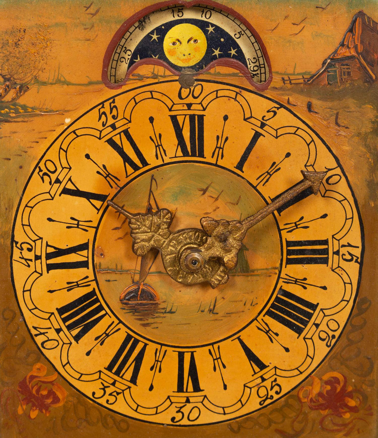 A Dutch Carved and Painted Wall Clock