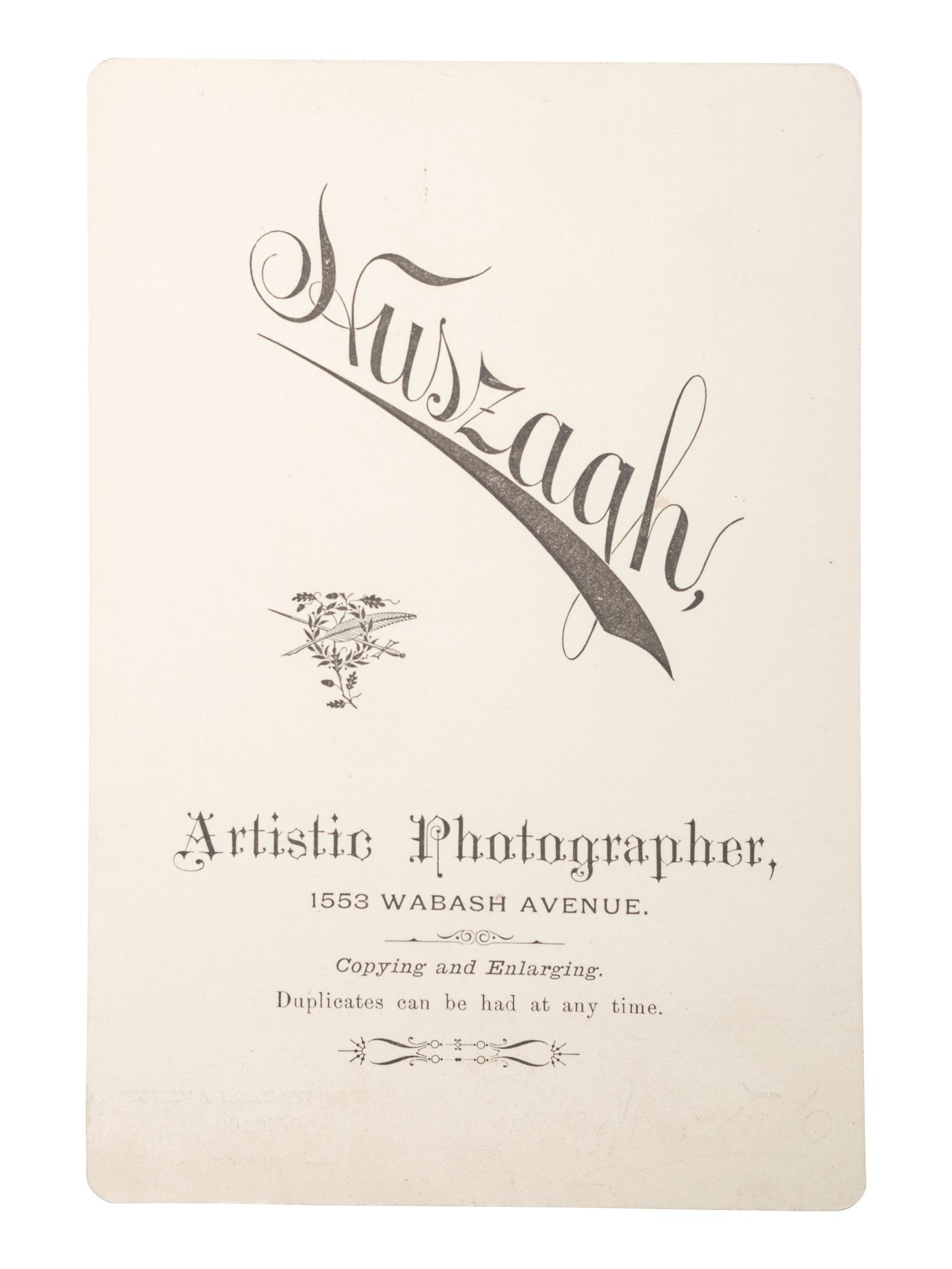 [EARLY PHOTOGRAPHY]. HUSZAGH, photographer. Cabinet card of African American firefighter. Chicago, IL, ca late 19th century.