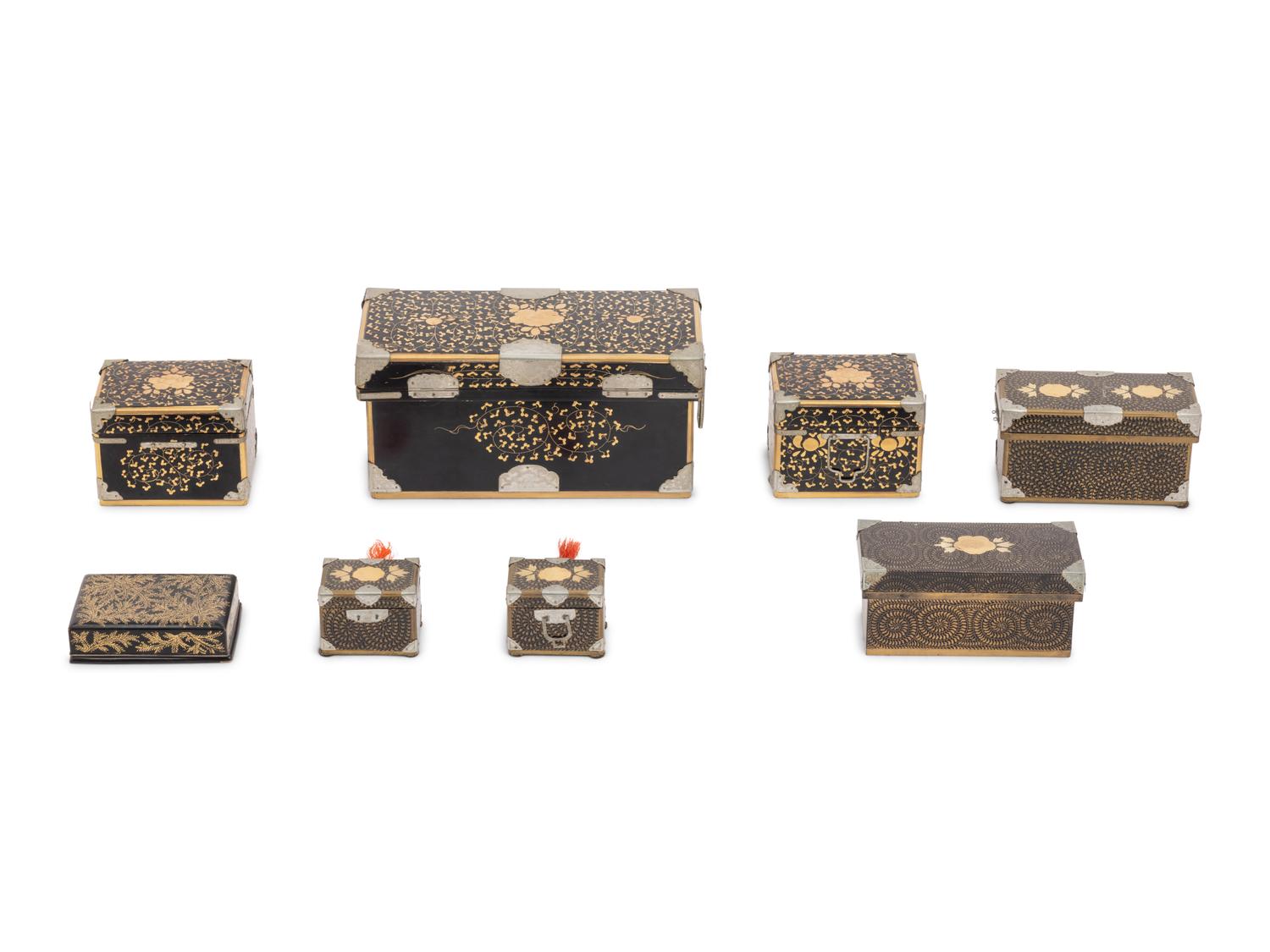 Eight Japanese Gilt and Black Lacquered Boxes