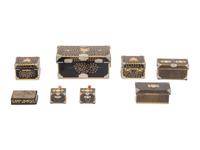 Eight Japanese Gilt and Black Lacquered Boxes