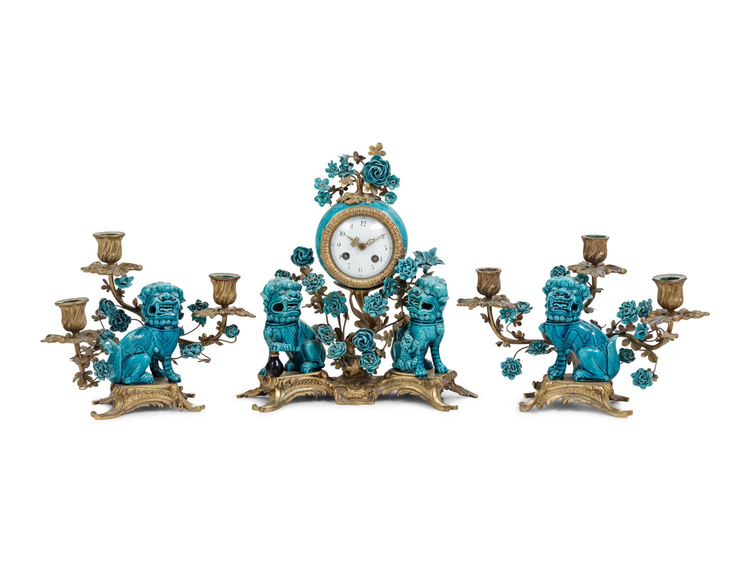 A Louis XV Style Gilt Bronze and Porcelain Clock Garniture