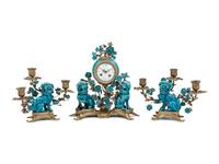 A Louis XV Style Gilt Bronze and Porcelain Clock Garniture