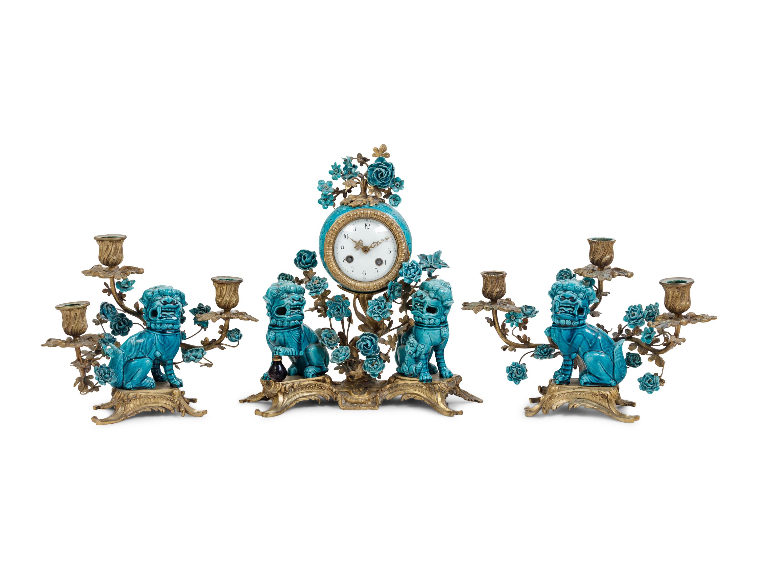 A Louis XV Style Gilt Bronze and Porcelain Clock Garniture