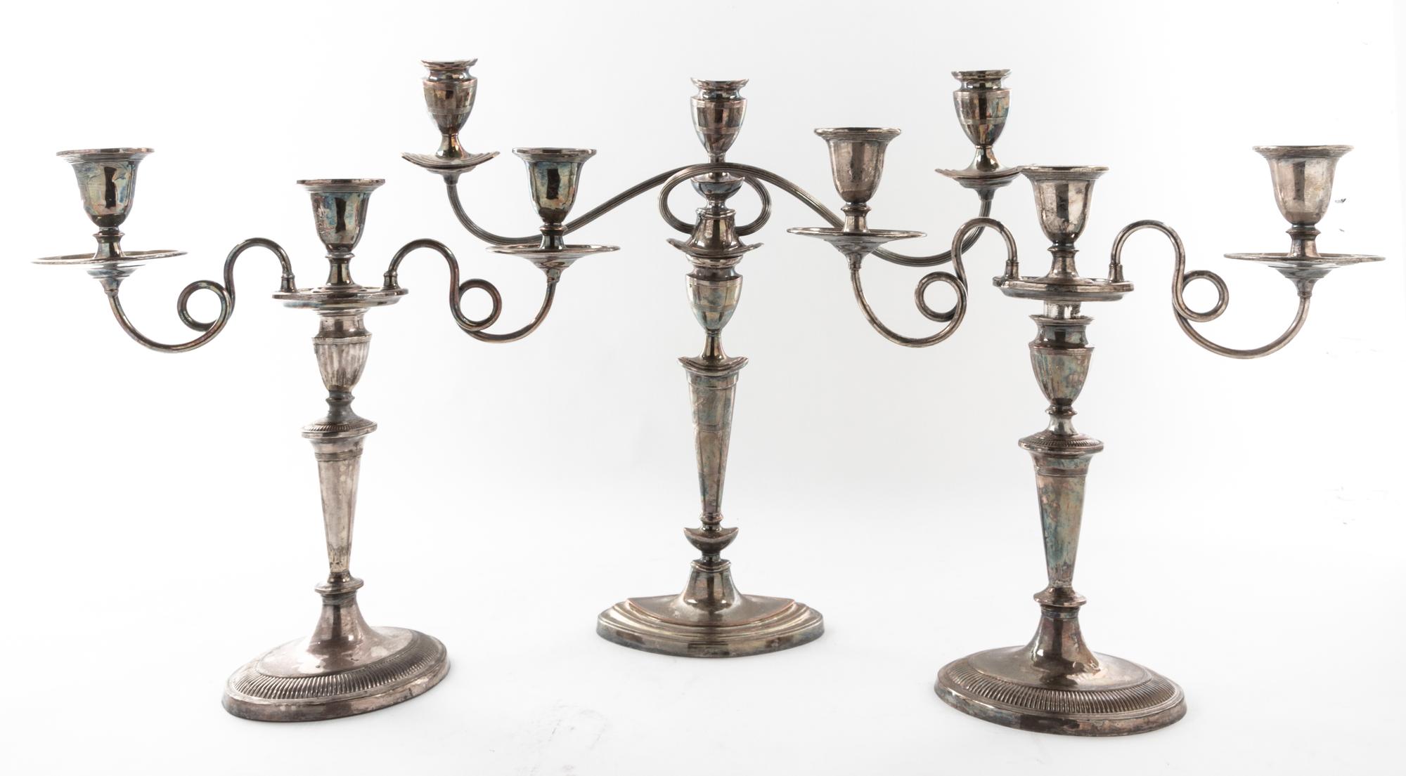 A Pair of English Silver-plate Three-Light Candelabra, 19TH/20TH CENTURY, with an associated candelabrum