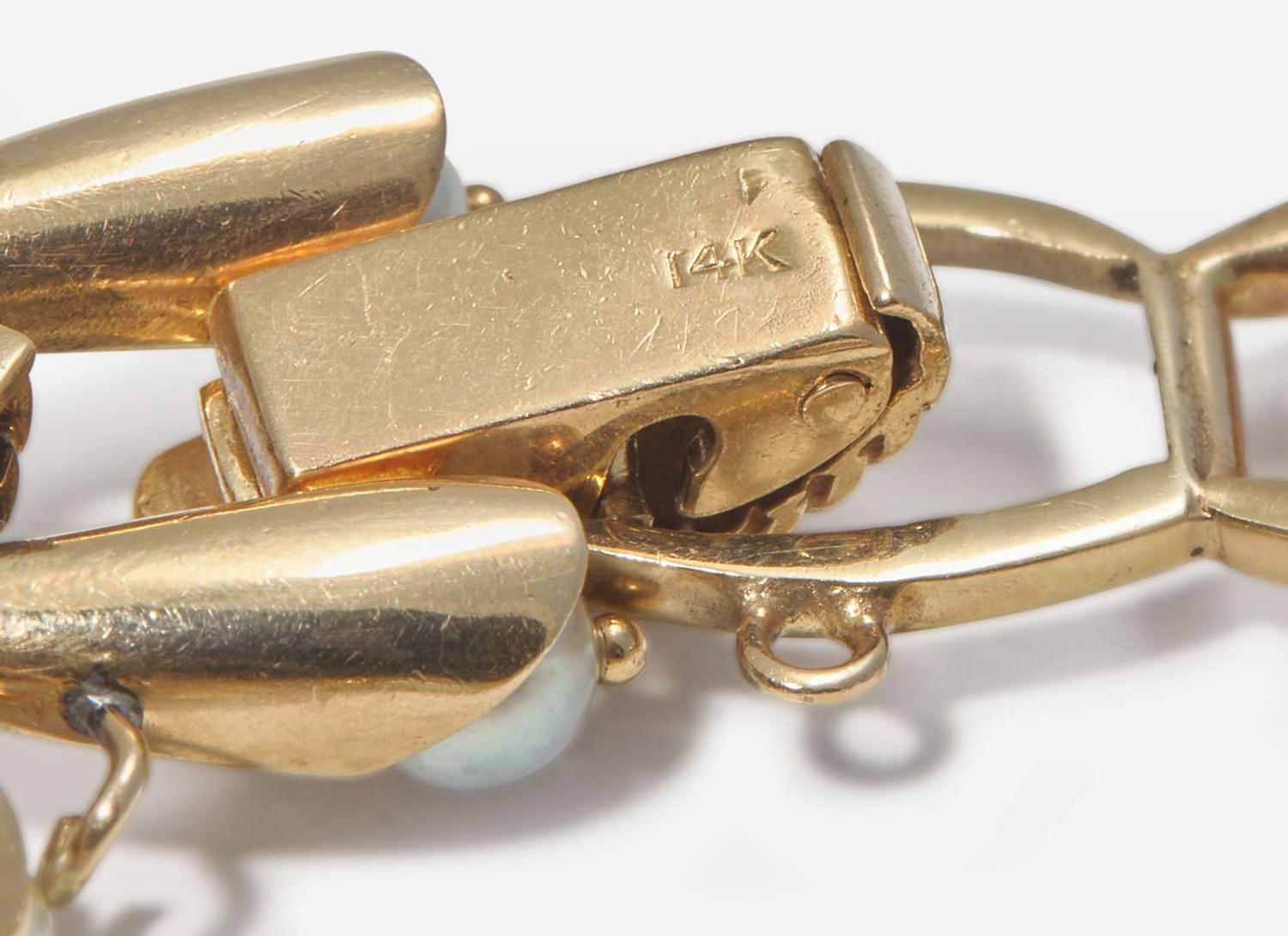 A 14K Yellow Gold and Pearl Bracelet