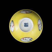A Chinese Yellow Ground 'Medallion' Porcelain Bowl, Qing Dynasty, 18th Century or Later 清中期 黃地粉彩開光松鶴延年圖碗
