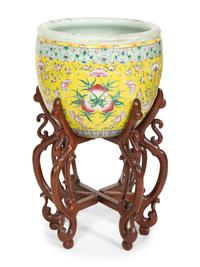A Chinese Export Famille Jaune Jardinière on a Hardwood Stand