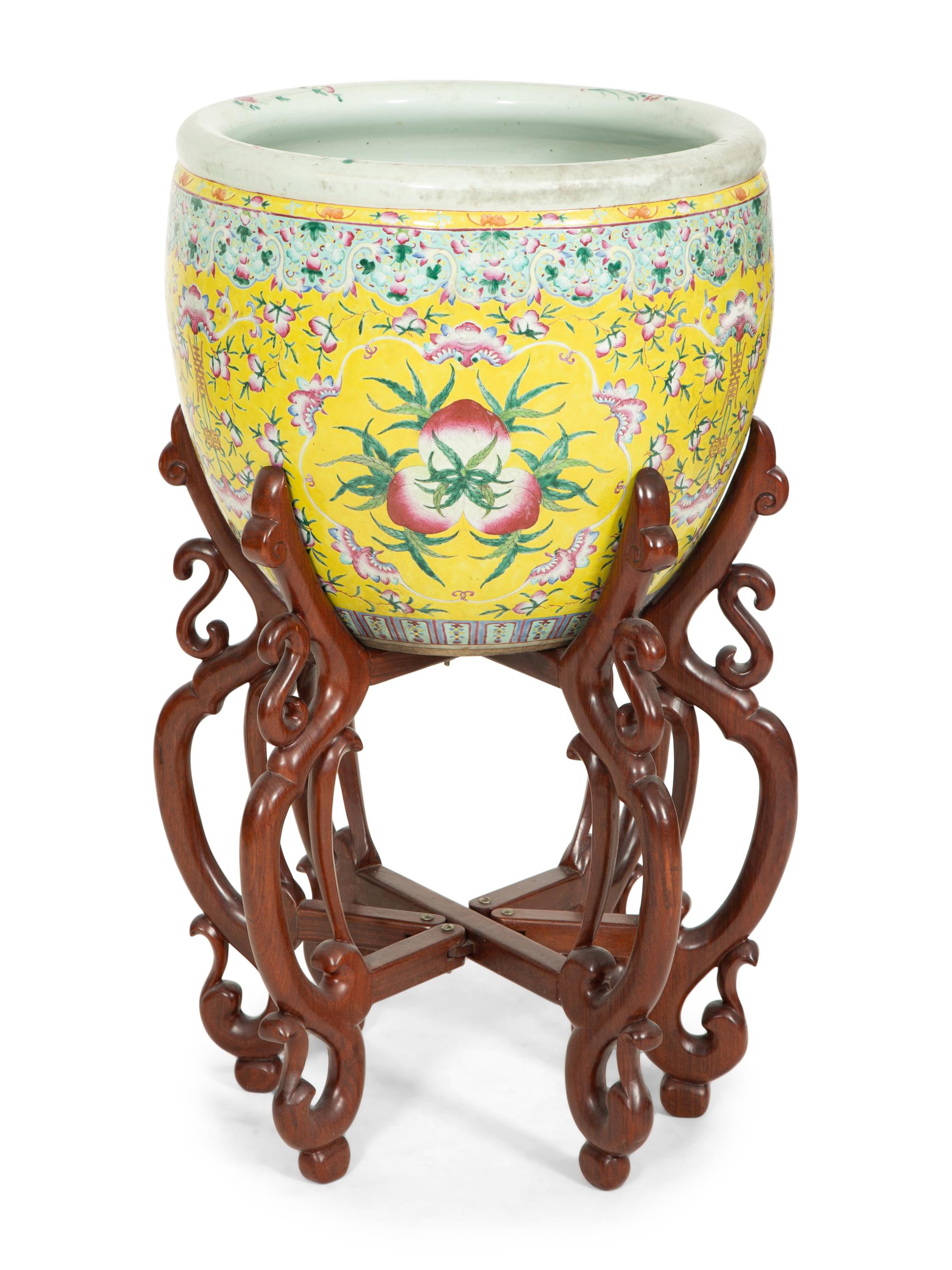 A Chinese Export Famille Jaune Jardinière on a Hardwood Stand