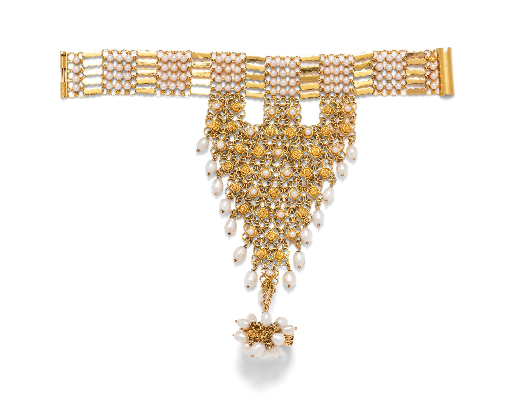A Yellow Gold and Cultured Pearl Ring/Bracelet,