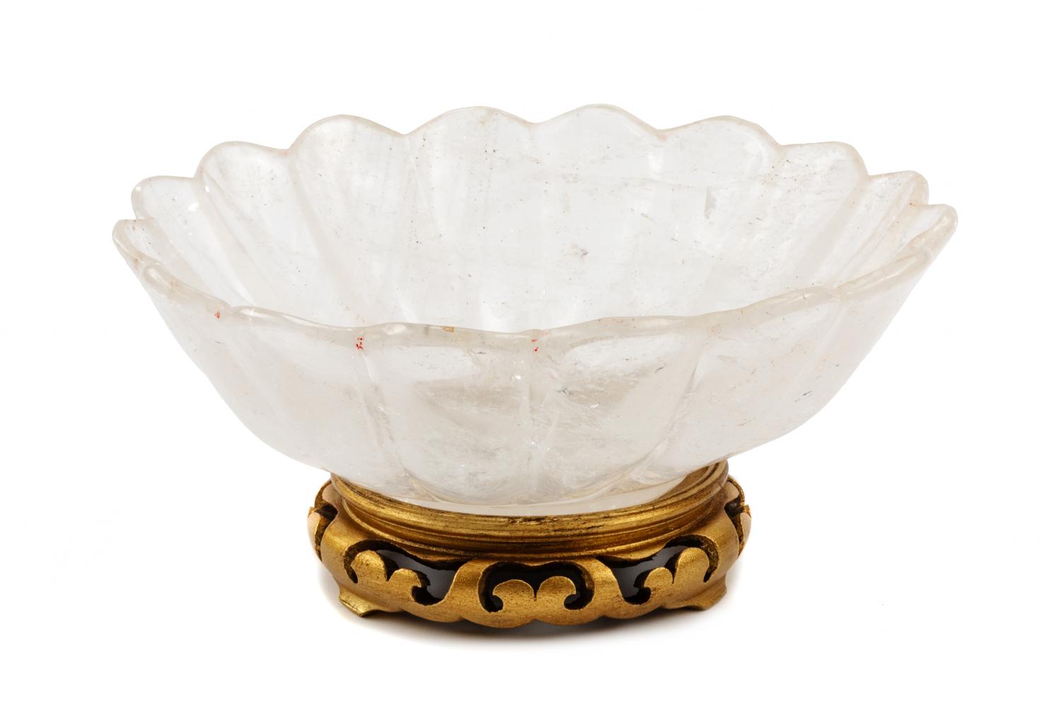 A Carved Rock Crystal Center Bowl on a Giltwood Base