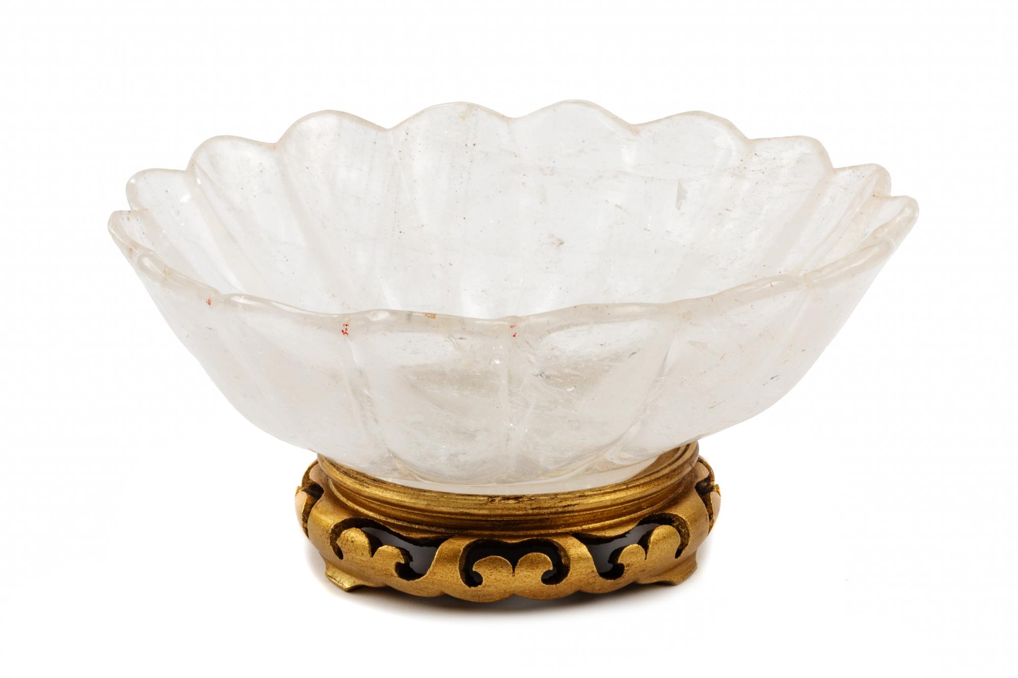A Carved Rock Crystal Center Bowl on a Giltwood Base