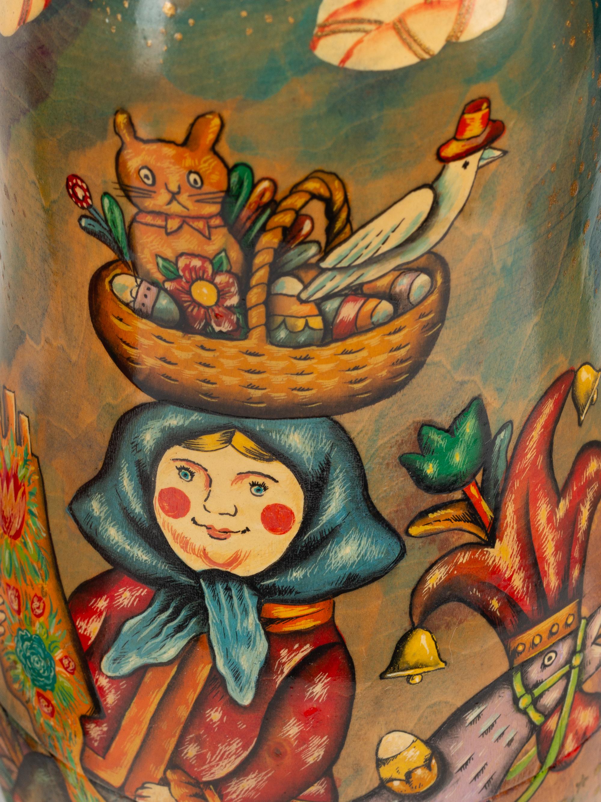 A Collection of Eight Russian Lacquer Matryoshka Nesting Dolls