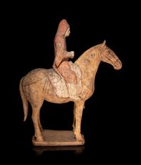 A Pair of Painted Pottery Equestrian Figures