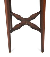 A Pair of George III Style Mahogany Candle Stands