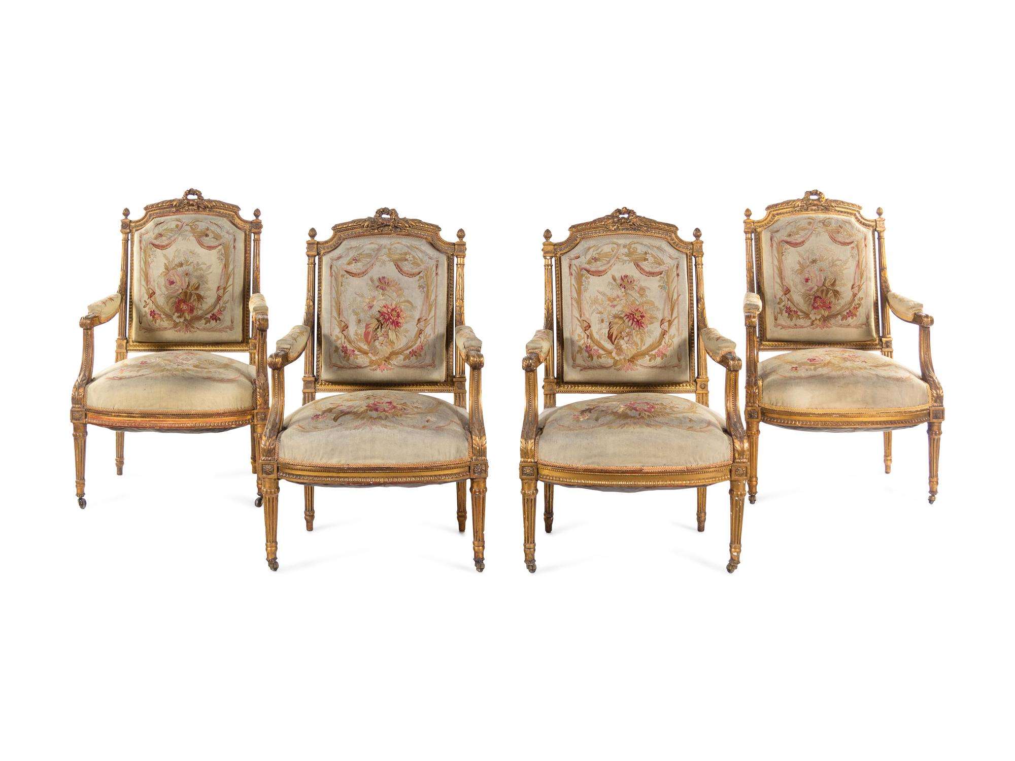 A Louis XVI Style Carved Giltwood Five-Piece Parlor Suite