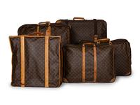 A Group of Five Louis Vuitton Travel Articles