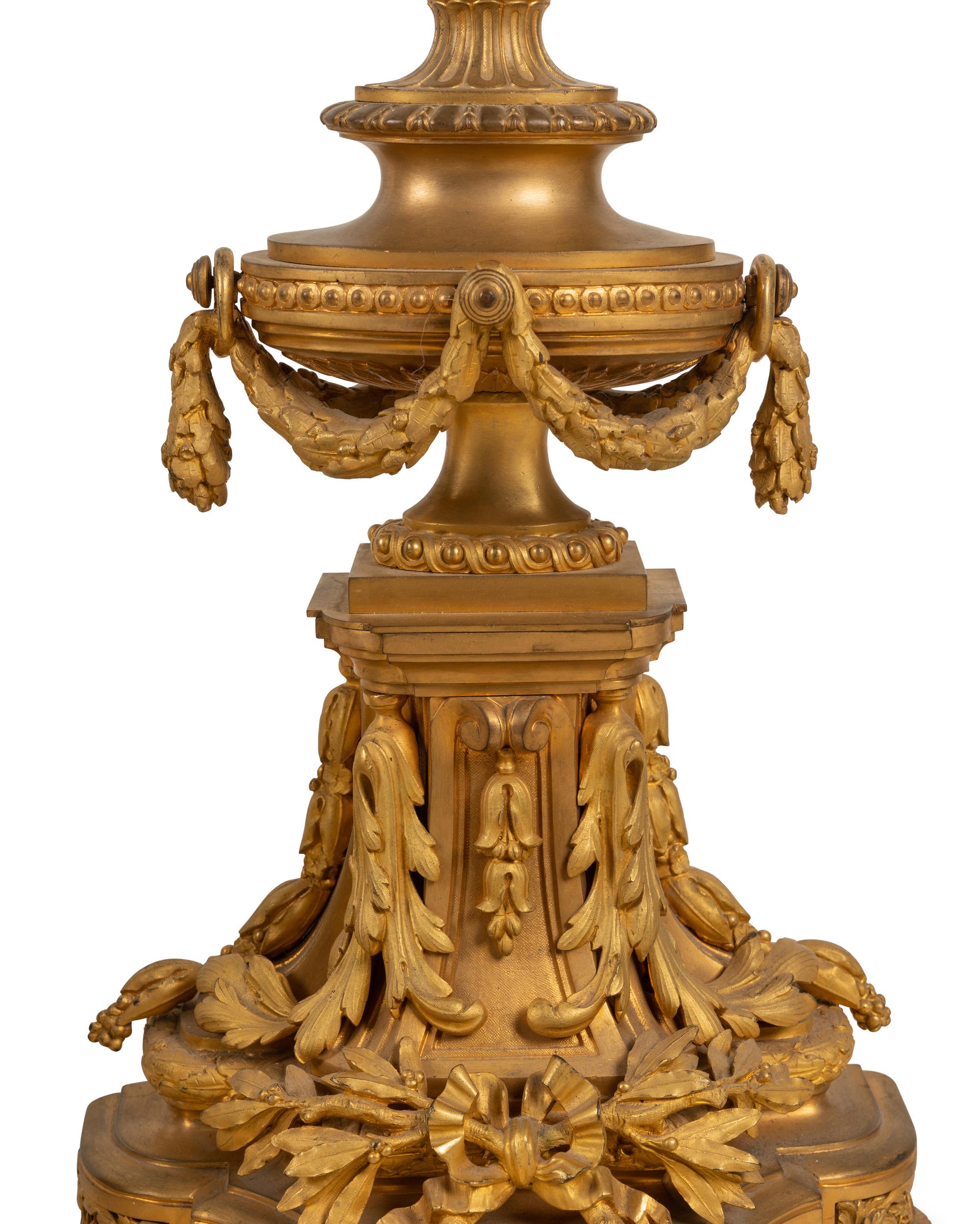 A Large French Gilt Bronze Clock Garniture