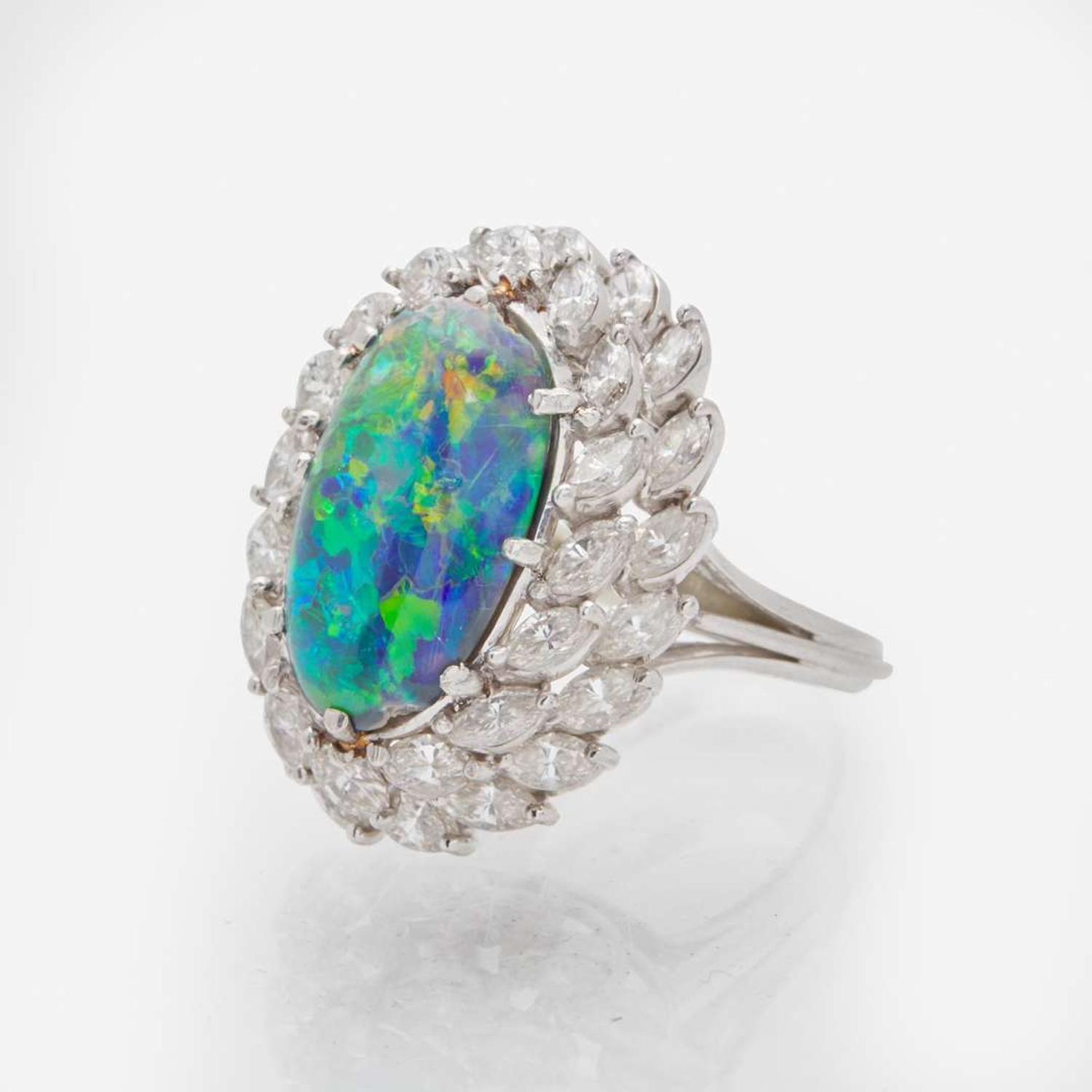 A Platinum, Black Opal, and Diamond Ring
