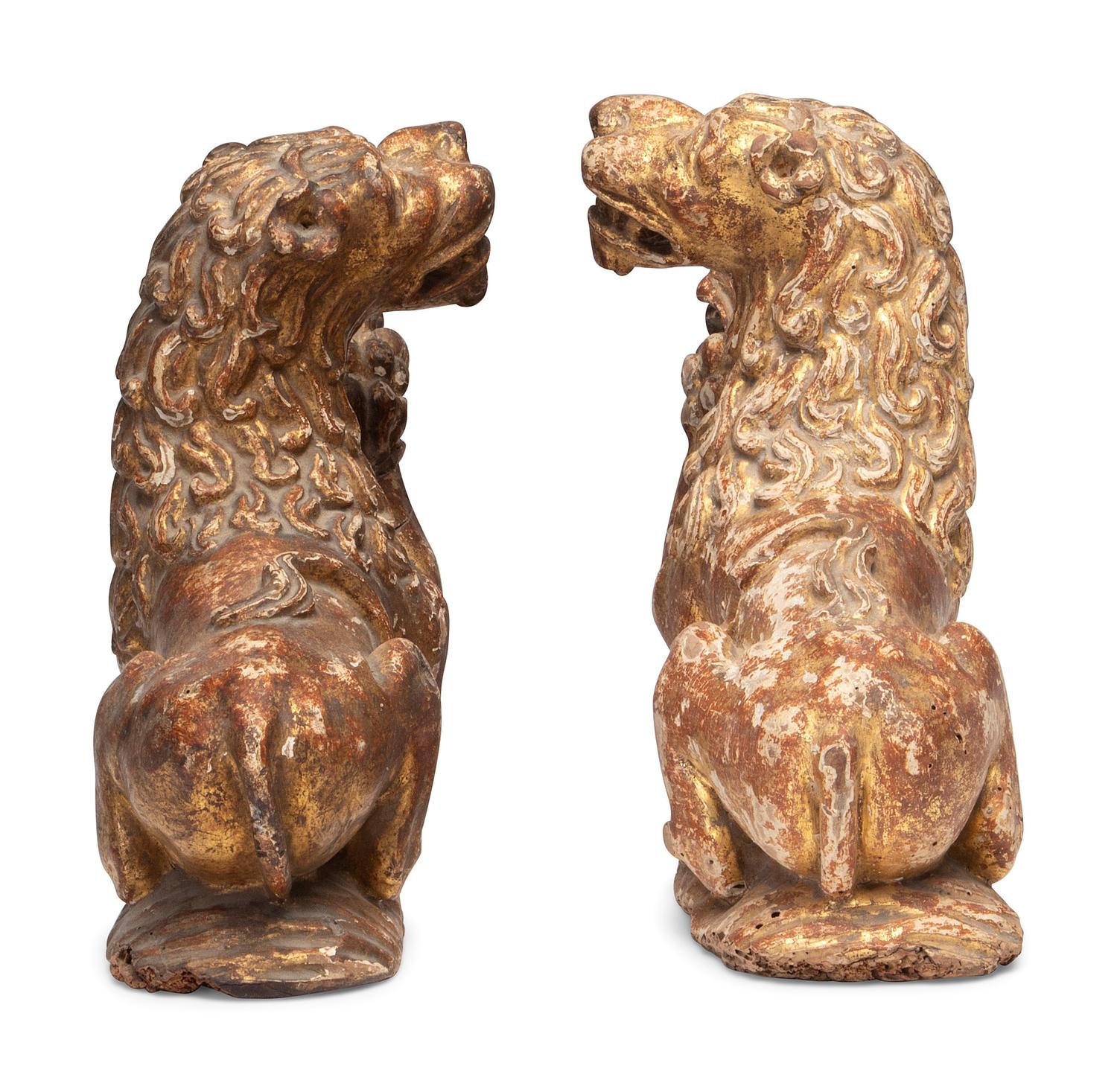 A Pair of Regency Giltwood Lion Mounts