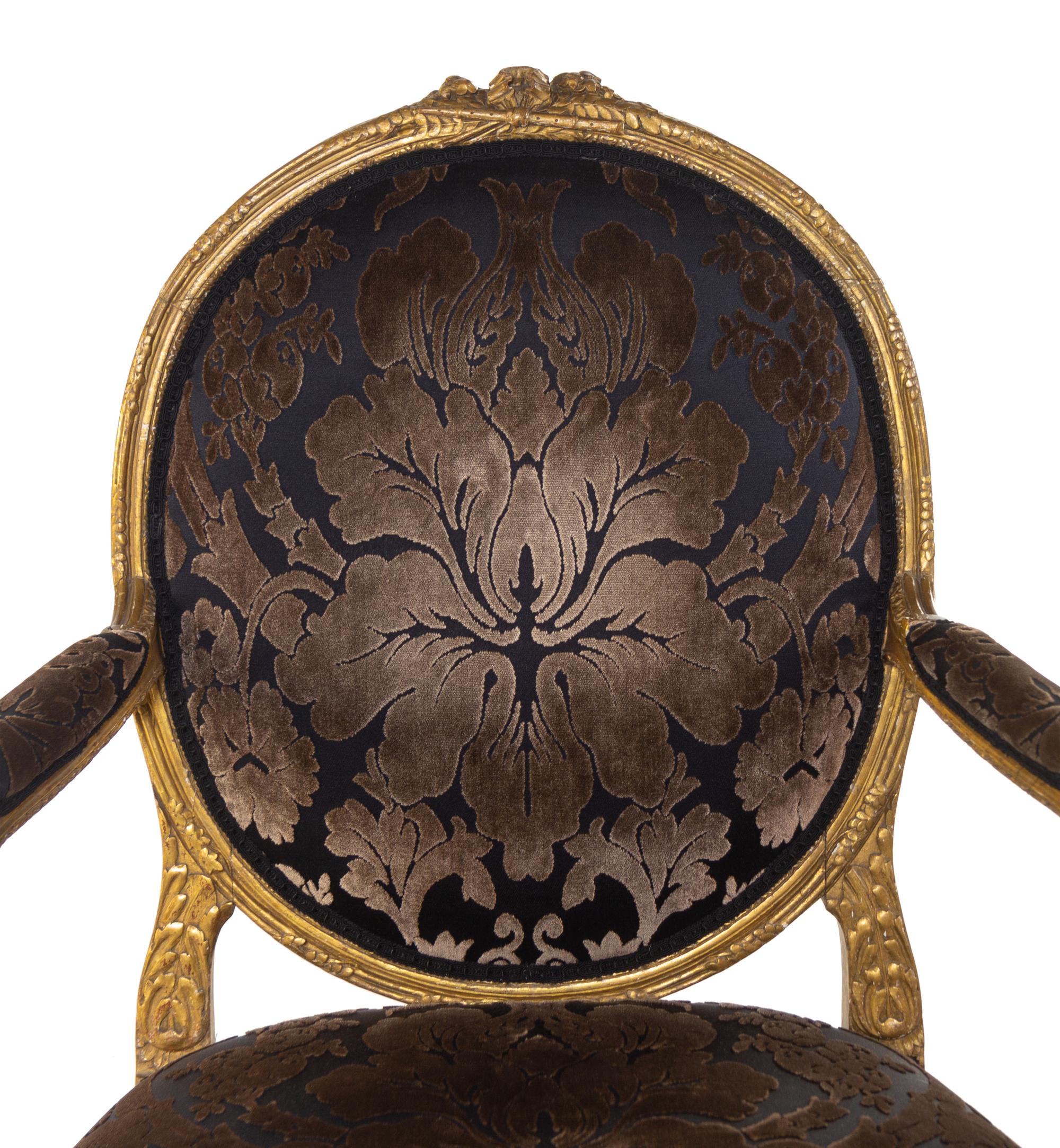 A Pair of Louis XVI Giltwood Fauteuils