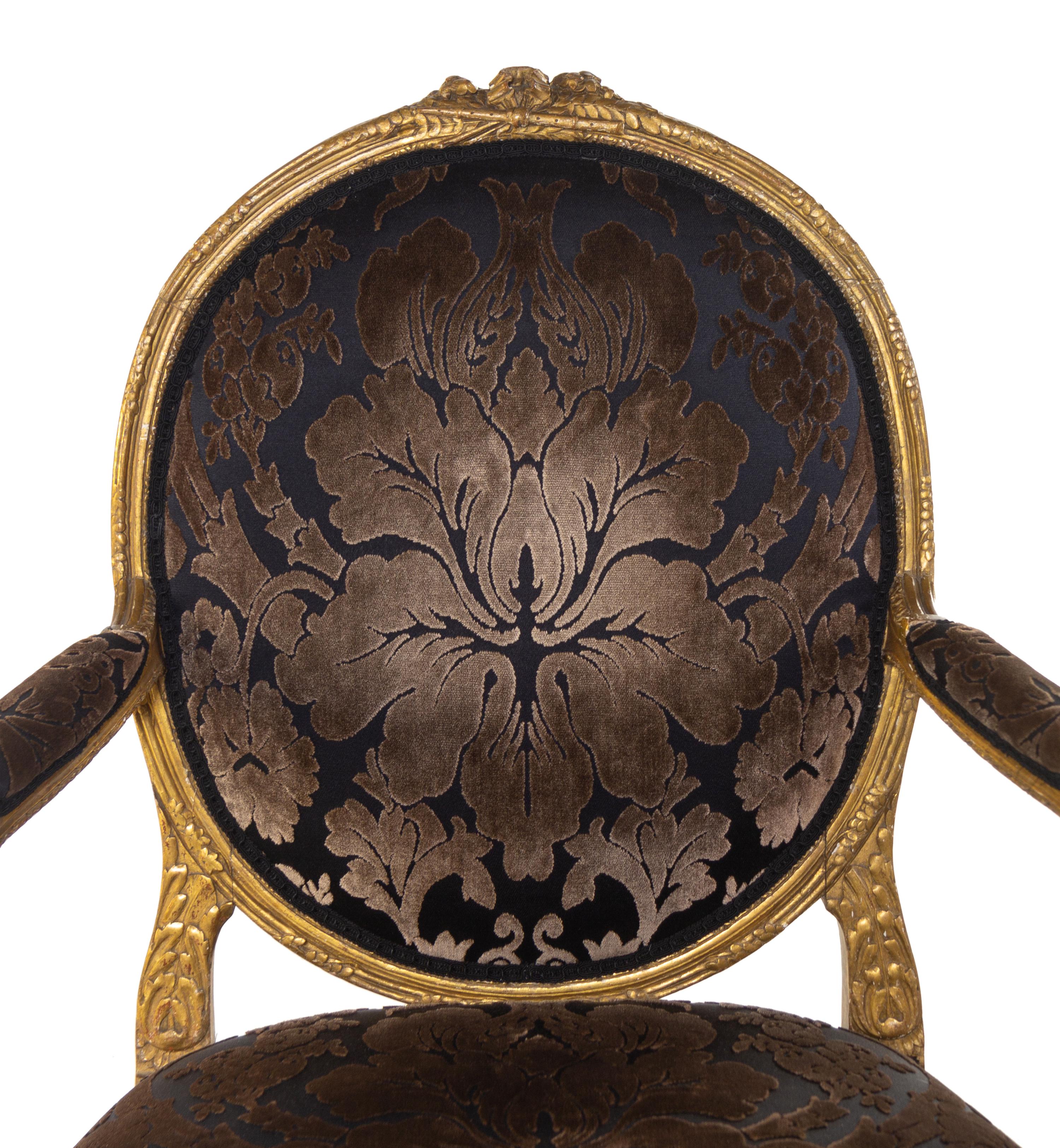A Pair of Louis XVI Giltwood Fauteuils