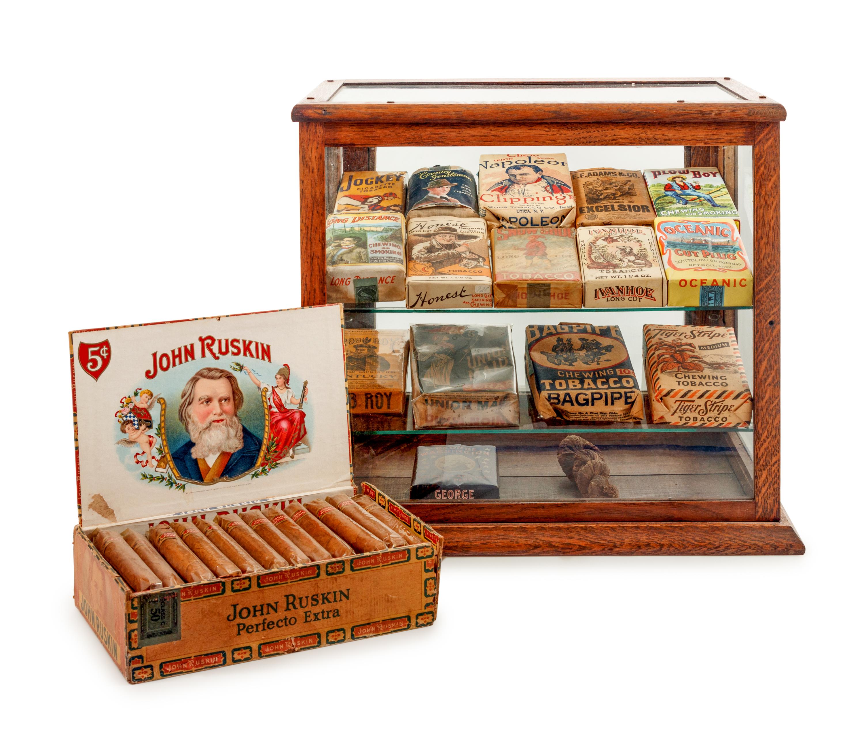 A Collection of Fifteen Tobacco Cartons and a Tobacco Rope in Display Case