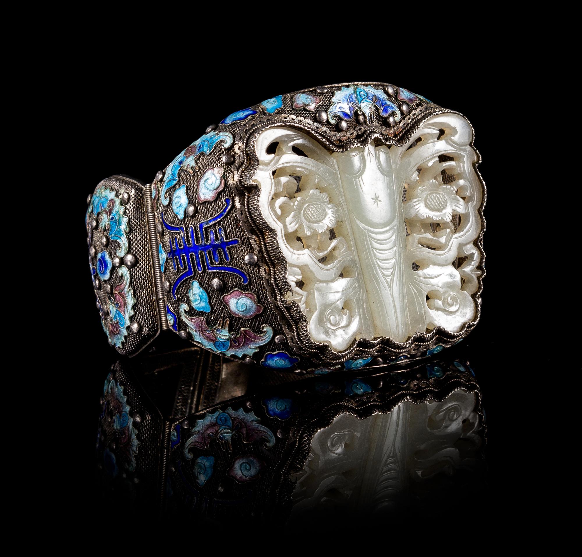 A Celadon Jade Inset Silver Filigree Bangle Height 2 1/4 inches.